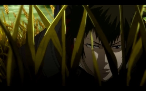 (Kogami crouching amidst the oats)